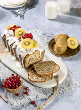 Yellow kiwi plum cake with banana, poppy seeds, currants and almonds