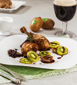 Guinness chicken thighs with braised shallots and grilled kiwi